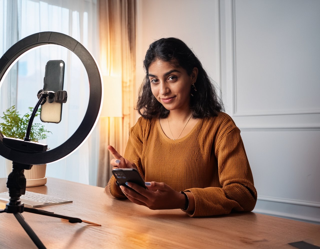 Accessible social media: creator adding captions to a video before posting