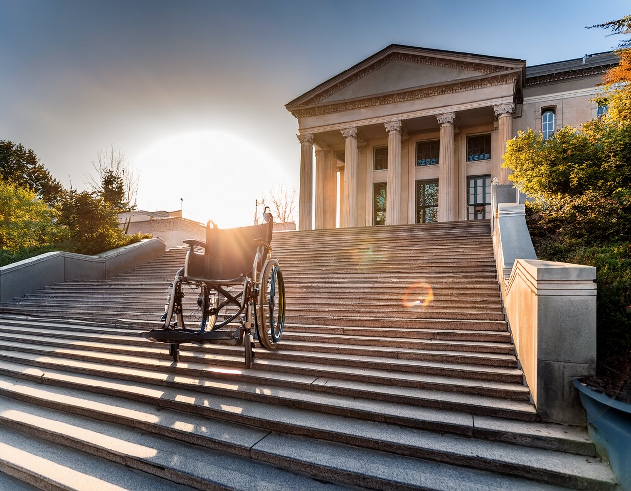 ADA standards for websites: equal access symbolised by a ramp beside courthouse steps