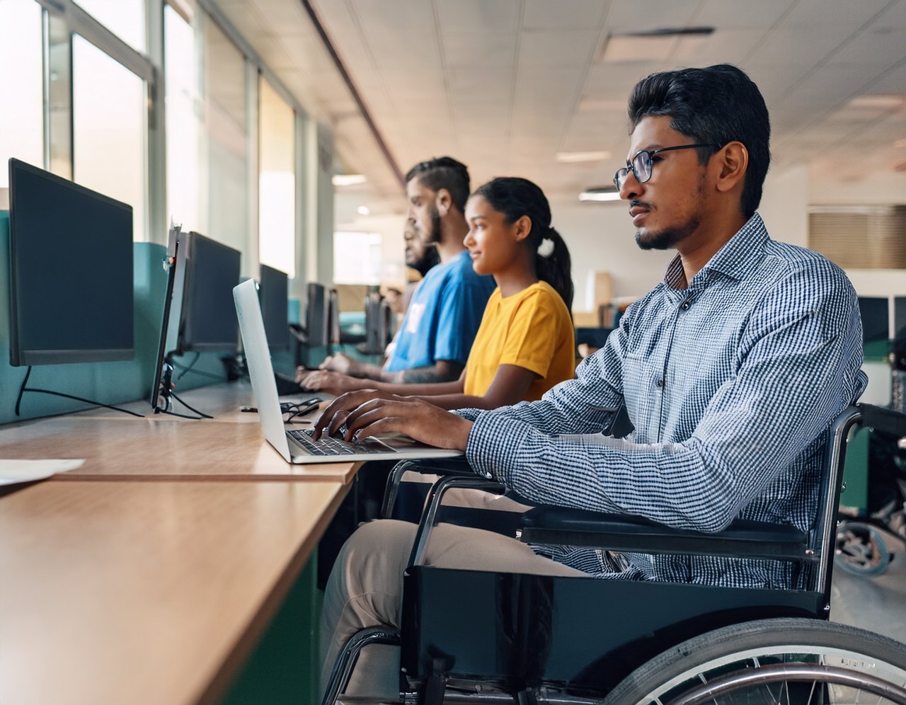 Disability rights in India: students with disabilities using computers at a university